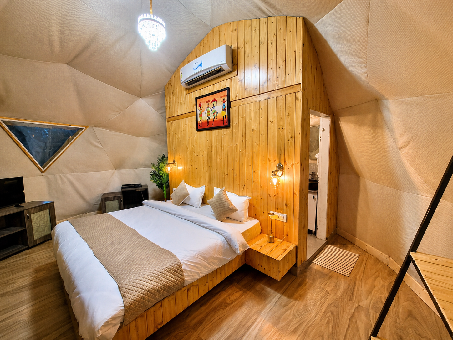 Warm wood-panelled dome bedroom with soft evening lighting